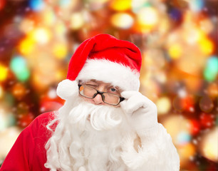 close up of santa claus winking