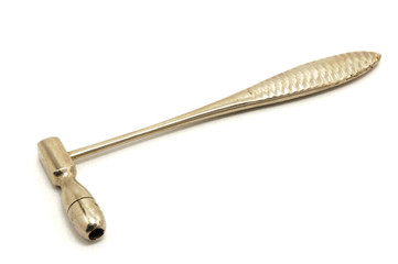 Vintage medical reflex  hammer on white background