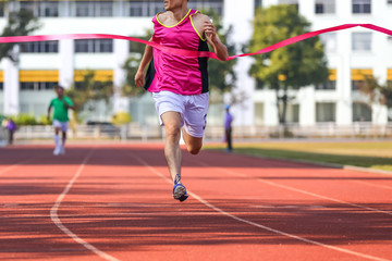 Runner crossing the finish line