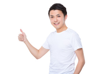 Young man with thumb up
