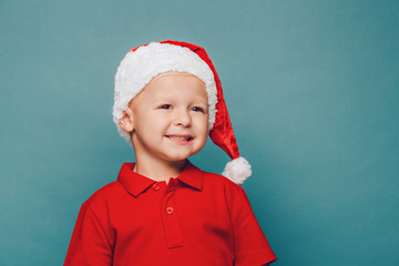 Boy in Santa red hat