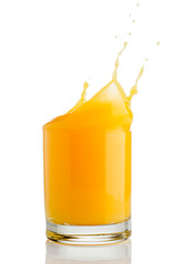 Naklejka na ściany i meble orange juice splash isolated on white