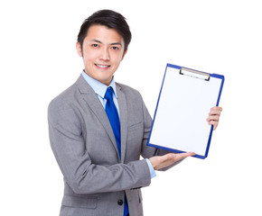 Businessman show with white paper on clipboard