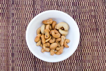 Cashew nuts in a white bowl