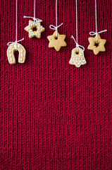 Christmas cookies on knitted background
