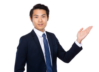 Businessman with open hand palm