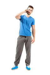 Fototapeta premium Sporty fit man on the mobile phone