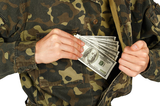 Man In Military Uniforms Pulls Money Out Of His Jacket