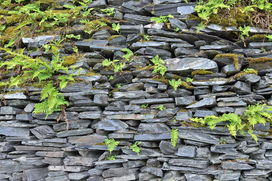 Typical wall in village built from shiste stones