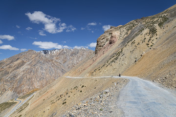 Biker on mountain road