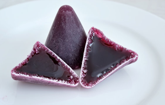 Purple traditional Belgian candies cuberdons