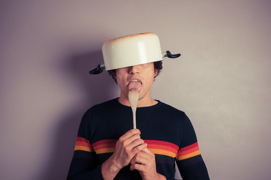 Silly Young Man With Pot On His Head