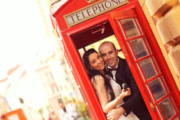 Red Phone Booth bride and groom love wedding