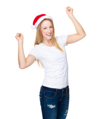 Fototapeta na wymiar Excited woman with christmas hat