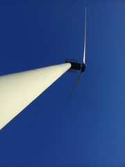 wind turbine against blue sky