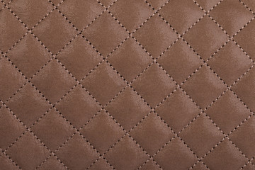 Light borwn quilted leather close-up