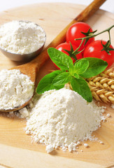 Wheat flour on wooden board