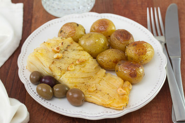 cod with potato on plate