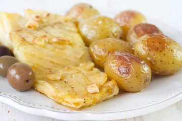 cod fish with potato and olives