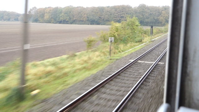 Travelling by train, looking out of the window