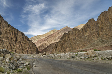 road among majestic rugged mountains