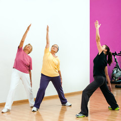 Senior women doing aerobic workout.
