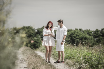 Young loving couple in the nature