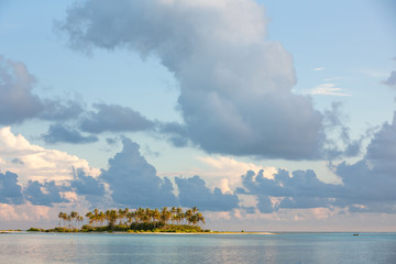 Naklejka na ściany i meble Scenic view at ocean with island near Maldives