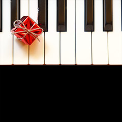Gift box on piano keys
