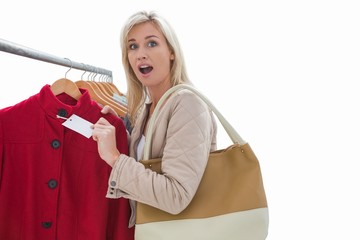 Pretty blonde shocked at price of jacket