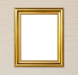 golden frame on wood wall background