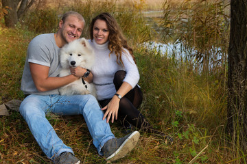Young couple with a dog