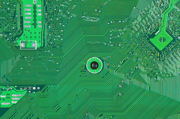 Close up of a printed green computer circuit board