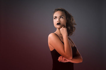 Woman in black dress.