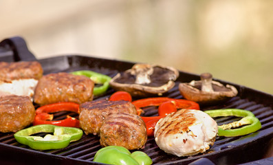 BBQ cooking with chicken mushroom and peppers
