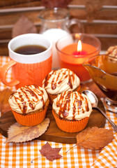 Carrot cupcakes with caramel cream cheese topping