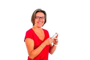 Woman in red t shirt on smartphone in studio