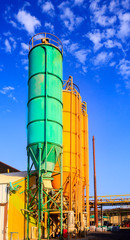 Three old towers on chemical plant
