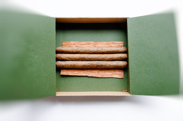 Luxury cigarillos in green luxury box for smokers