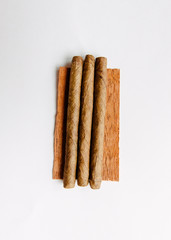 Cigarillos on white background for smokers