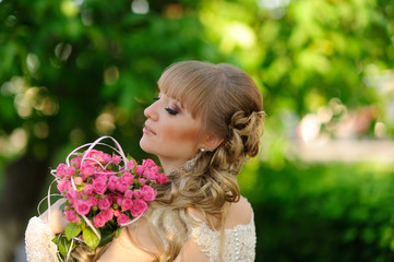 Fototapeta premium Portrait of Beautiful Woman with flowers