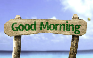 Good Morning sign with a beach on background