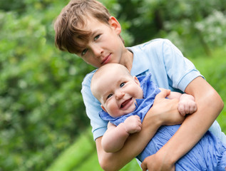 Portrait of happy brother and sisters