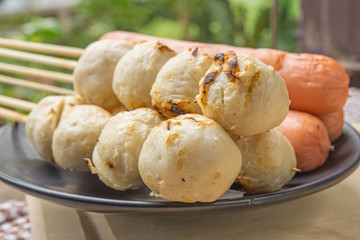The grilled sausage and meat ball in Thai style