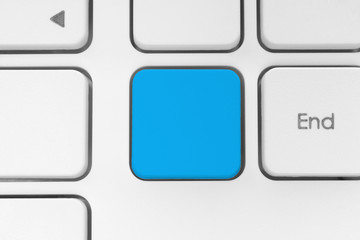 Blank blue button on the keyboard close-up.