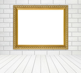 golden frame in room with white wood wall (block style) and wood