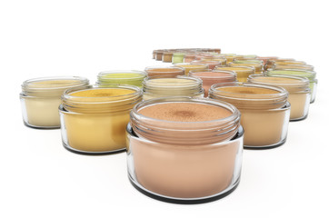 Colorful clear glass jars isolated on white background.