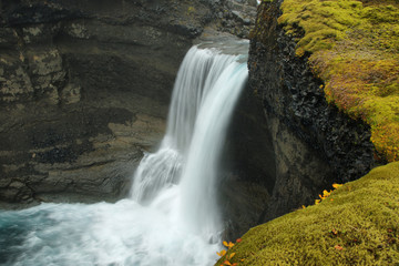 Fototapeta na wymiar Ofaerufoss waterfall in Eldgja canyon