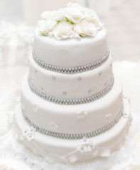 Wedding cake on light background