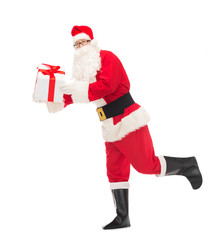 man in costume of santa claus with gift box